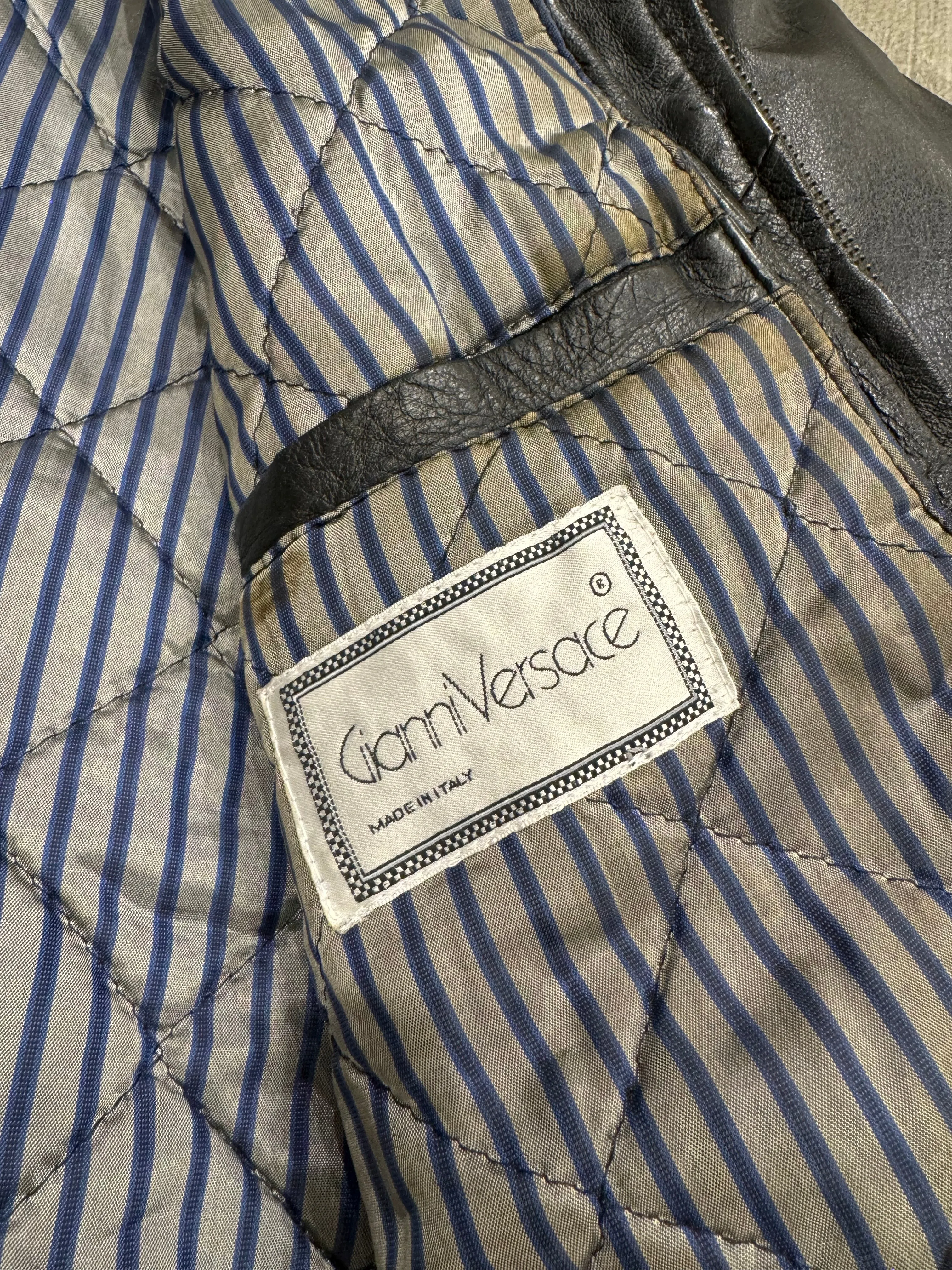 1980s GIANNI Versace bondage leather bomber jacket