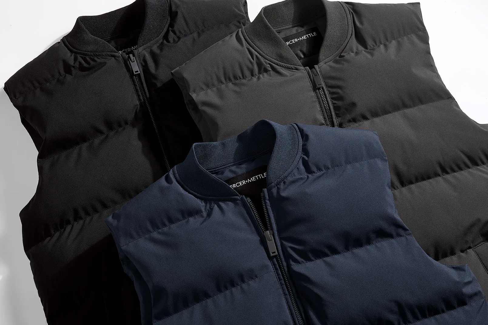 Delta Sigma Pi Puffy Vest by Mercer Mettle®