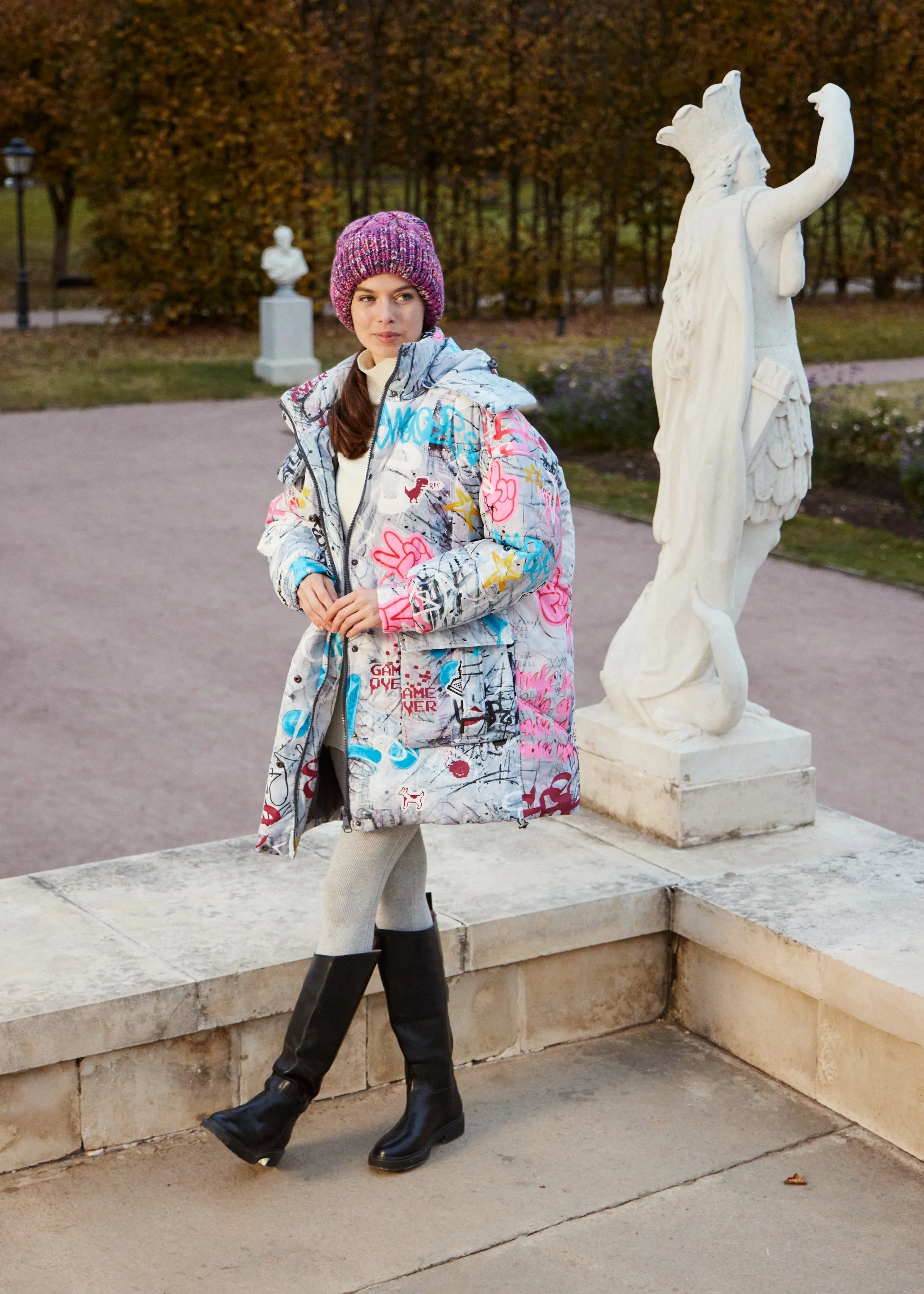 Graffity Printed Puffer Jacket for Women – Artistic & Cozy Design