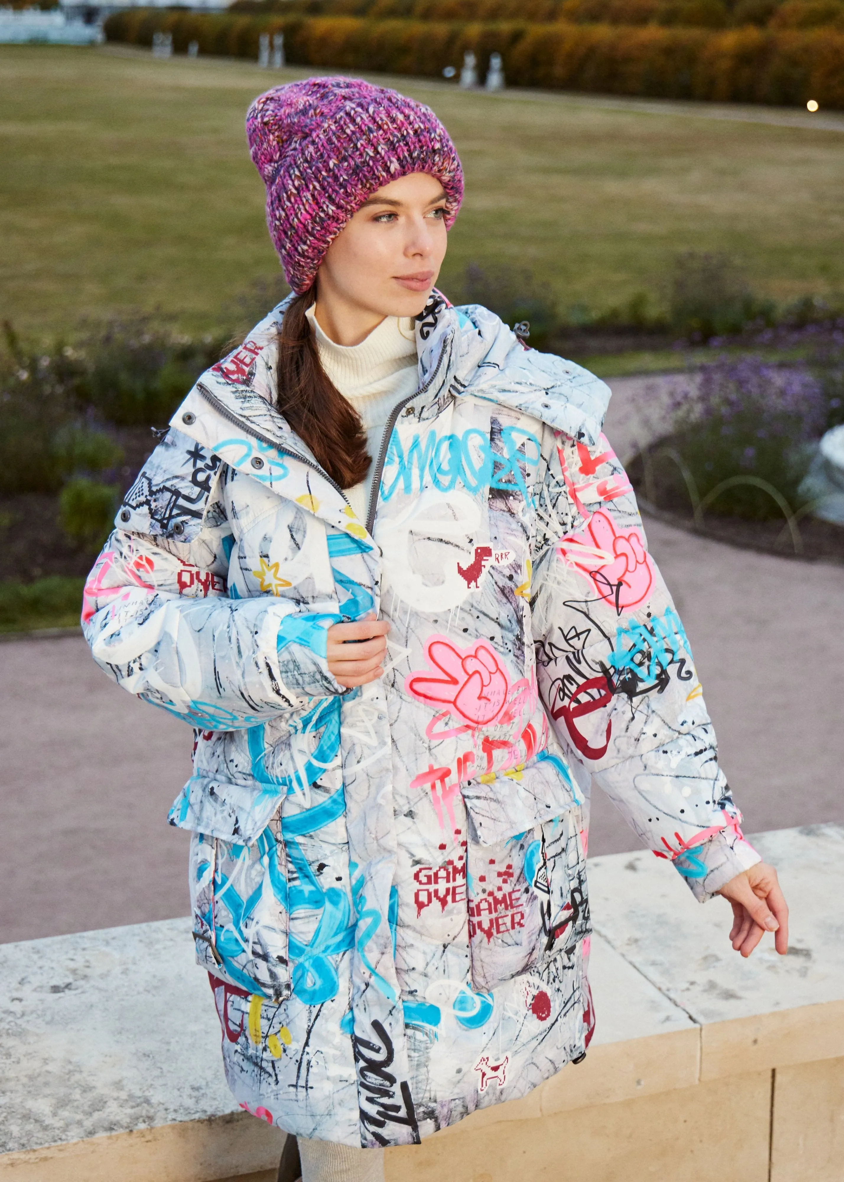 Graffity Printed Puffer Jacket for Women – Artistic & Cozy Design