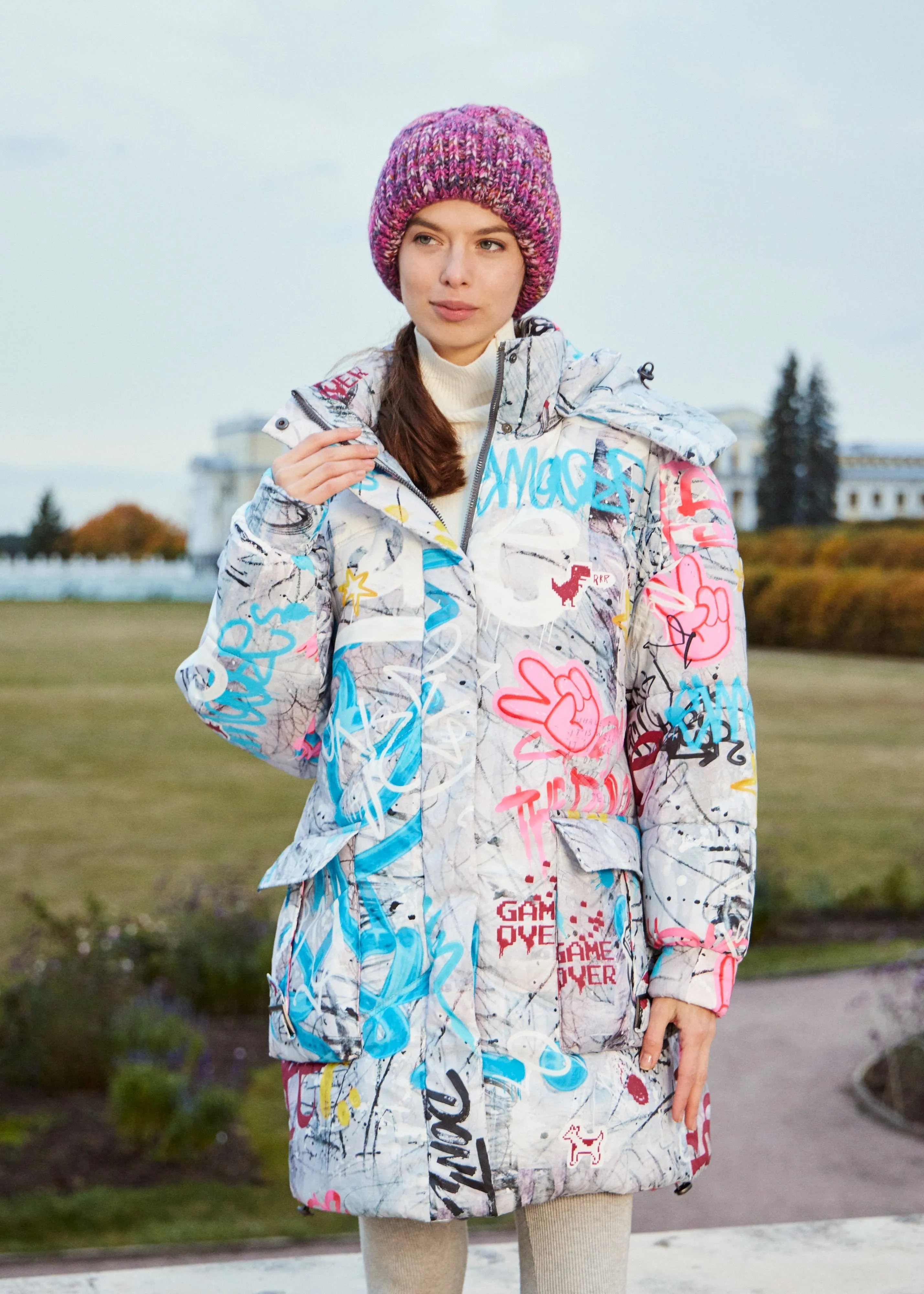 Graffity Printed Puffer Jacket for Women – Artistic & Cozy Design