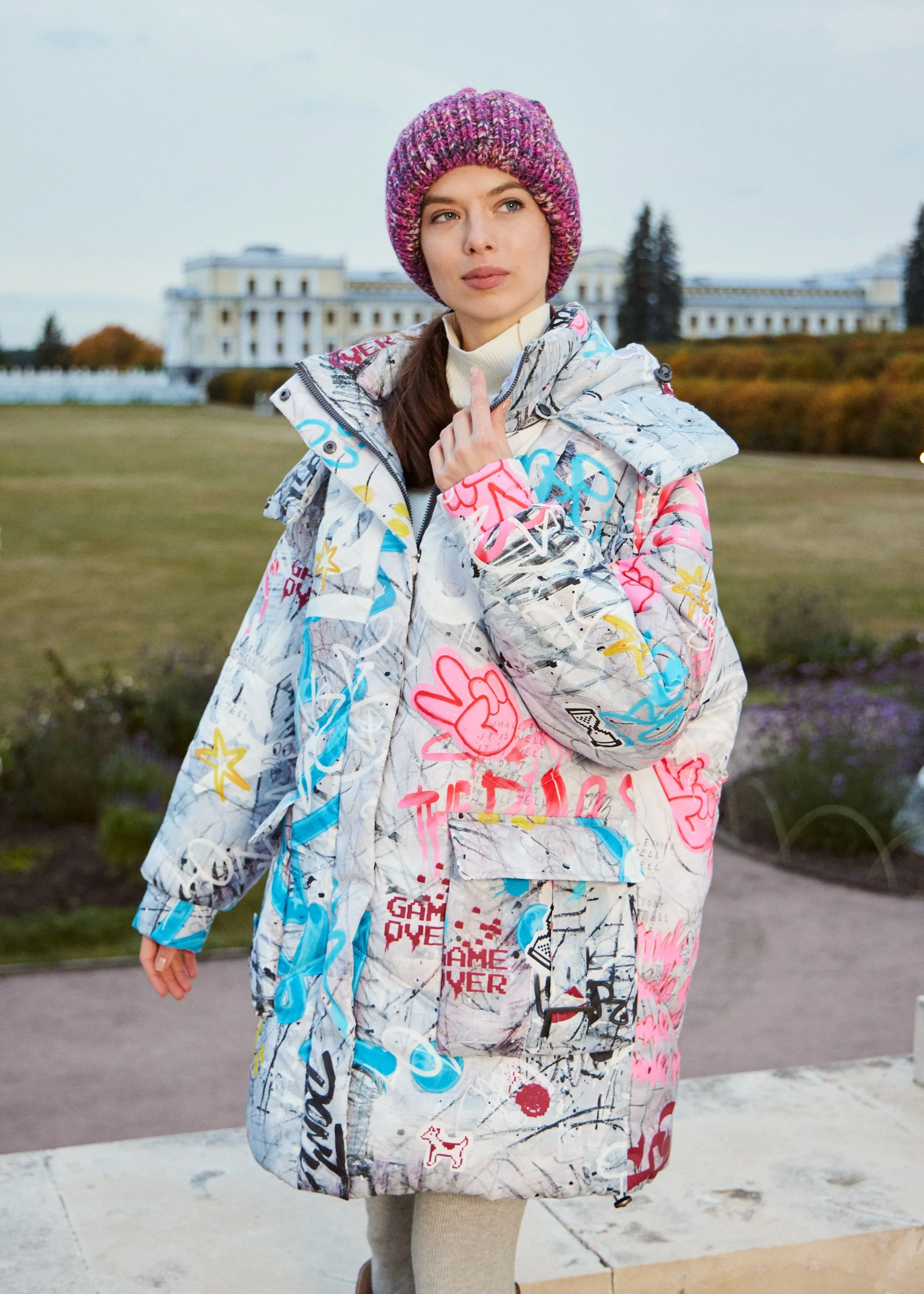 Graffity Printed Puffer Jacket for Women – Artistic & Cozy Design