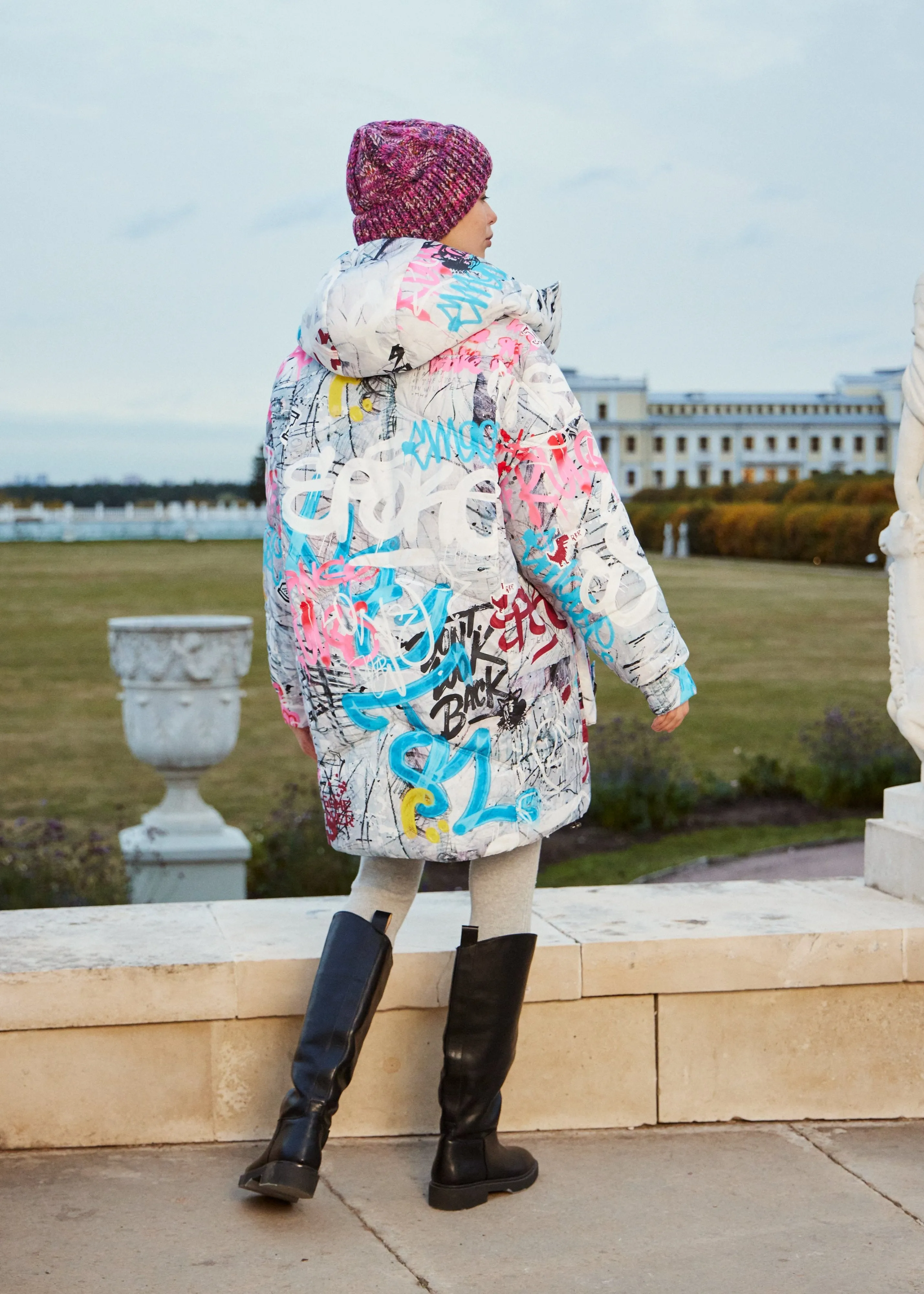 Graffity Printed Puffer Jacket for Women – Artistic & Cozy Design