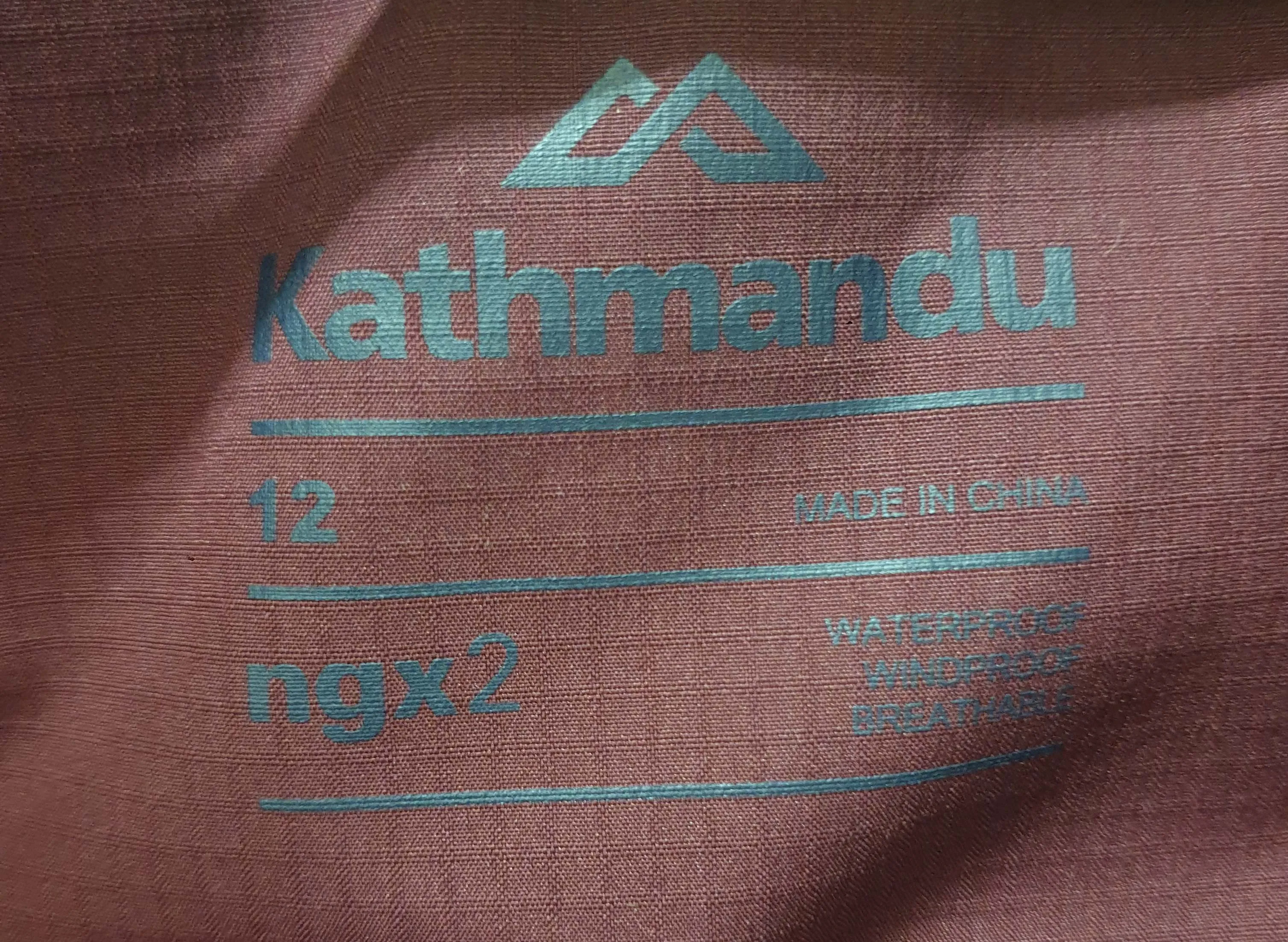 Kathmandu purple waterproof and windproof jacket size 12
