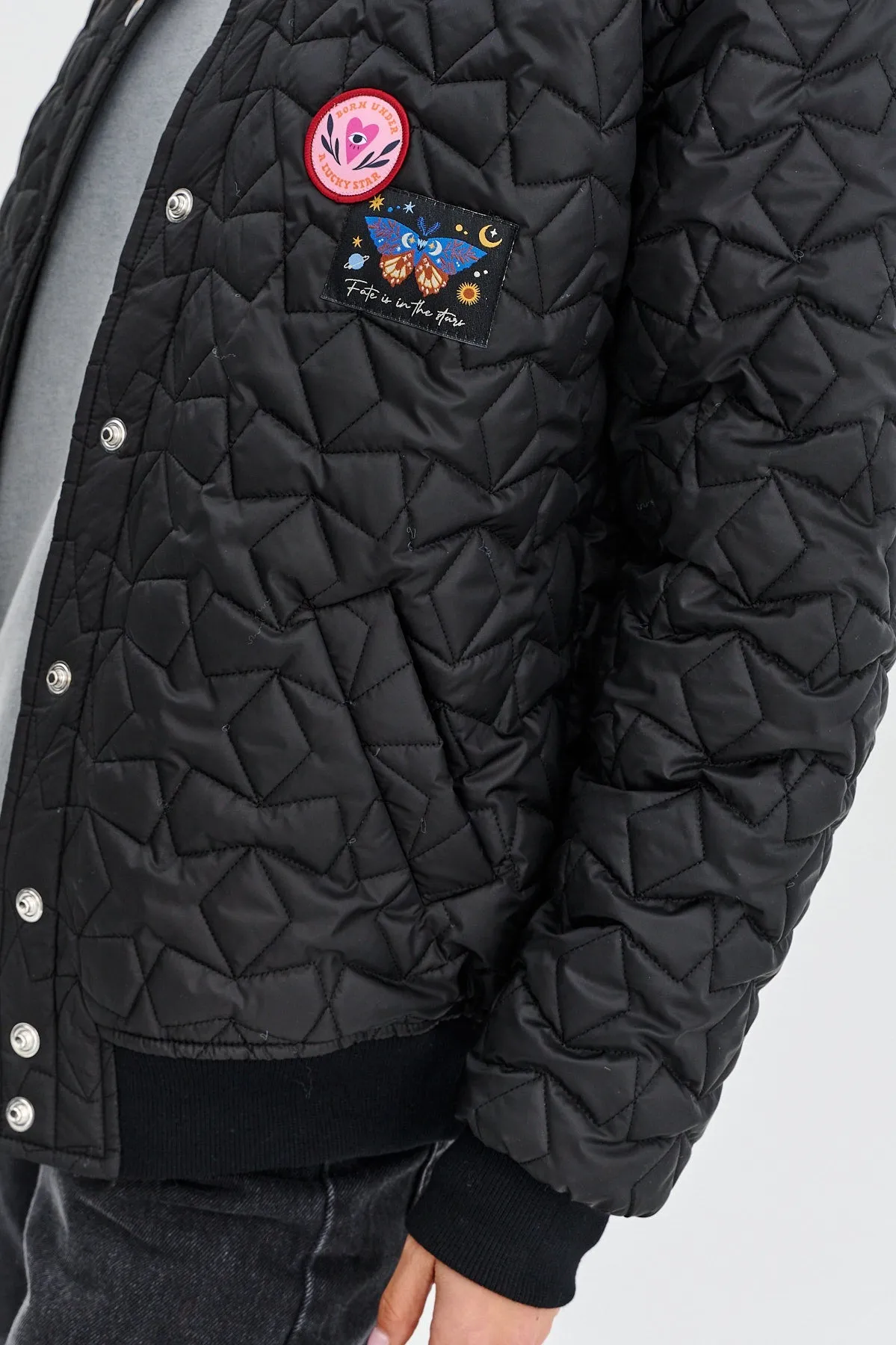 Own the Universe quilted bomber