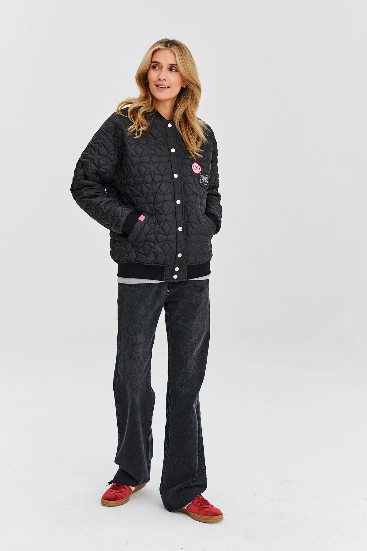 Own the Universe quilted bomber