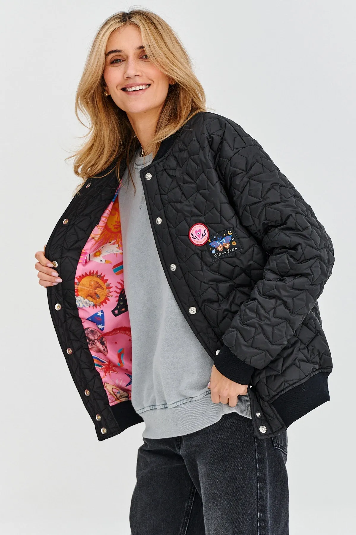 Own the Universe quilted bomber