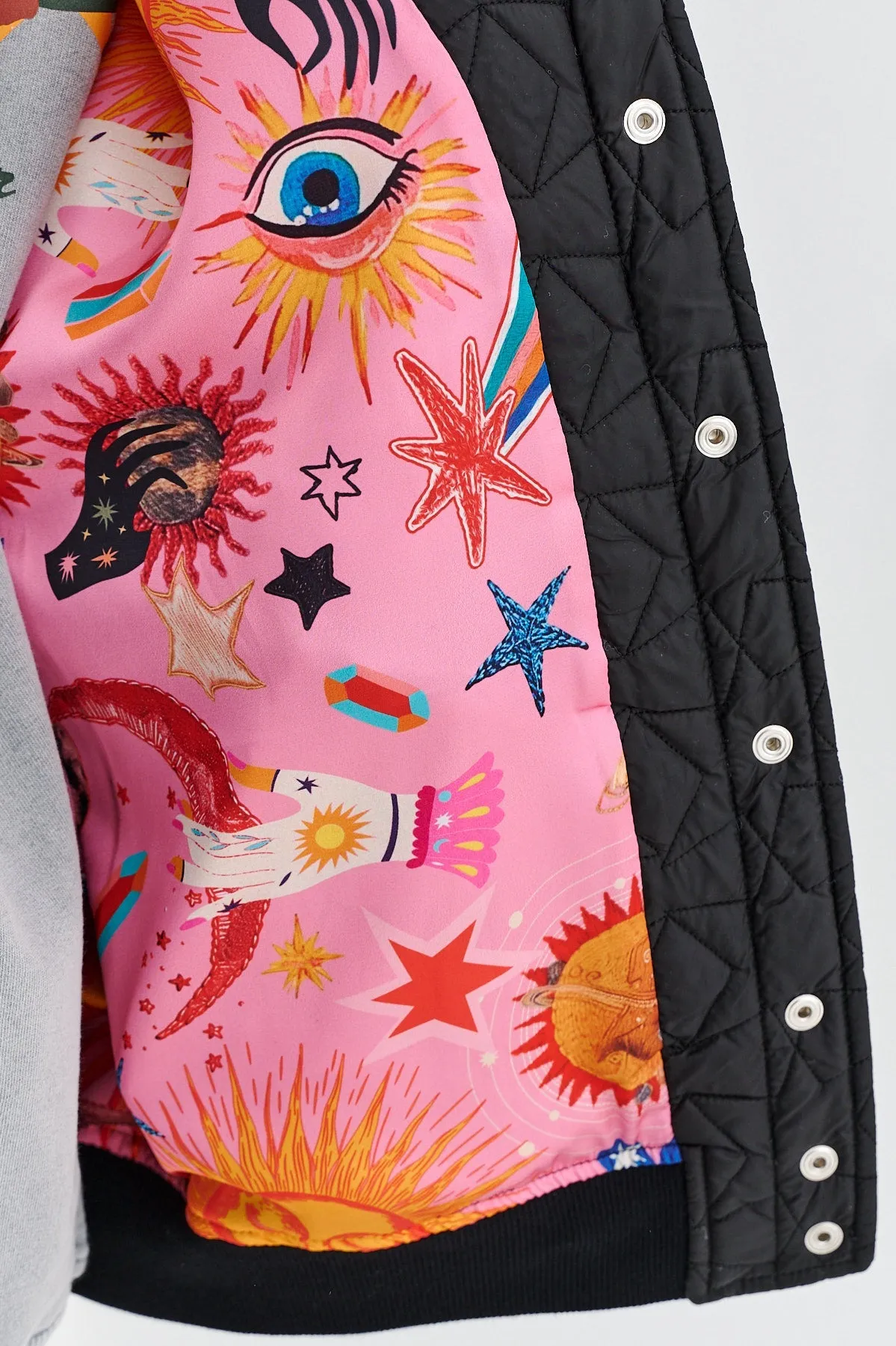 Own the Universe quilted bomber